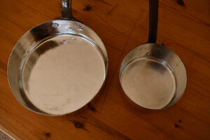 14cm Allez Frères saucepan and 22cm Grands Magasins du Louvre sauté